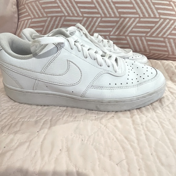 White, gently used Nike Air Force 1 tennis shoe. - Picture 1 of 6